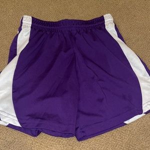 Medium length purple athletic shorts